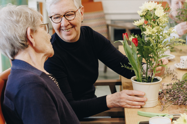 10 02 2023 Zorgpartners Savelberg Bewoner Familie Plant Tafel